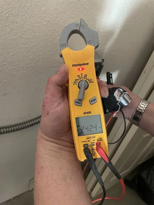 Voltage testing with clamp meter during Recessed Lighting Installation in Bradfordville